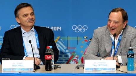 International Ice Hockey Federation president Rene Fasel, left, believes time remains to convince NHL commissioner Gary Bettman, right, to let NHL players compete at the 2018 Olympics in Pyeongchang, South Korea. fasel-rene-140218-1180