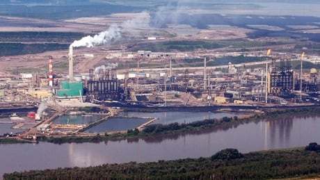 The Suncor mine facility along the Athabasca river as seen from a helicopter tour of the oil sands near Fort McMurray.
Oil Sands 20120710