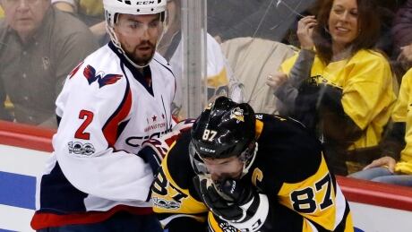 Sidney Crosby, right, told reporters he was in fact examined by a team doctor during the first intermission and didn't have to enter in the concussion protocol. Capitals Penguins Hockey