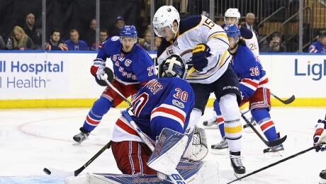 Buffalo Sabres' Jack Eichel scores a goal against New York Rangers' Henrik Lundqvist at Madison Square Garden on January 3, 2017. The teams will face off at Citi Field for the 2018 Winter Classic. rangers-sabres