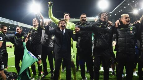 Antonio Conte, Manager of Chelsea and his team celebrate winning the Premier League after beating West Brom on Friday. chelsea-conte