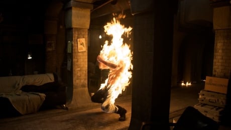 Winnipeg stuntman Sean Skene performs a shirtless body burn in the 2011 feature film The Divide. Winnipeg stuntman Sean Skene in The Divide