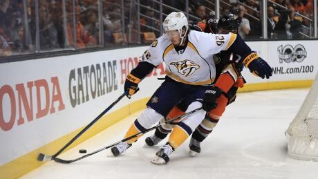Nashville Predators' Ryan Johansen #92 protects the puck from Ryan Kesler #17 of the Anaheim Ducks in the first period of Game 2. johansen-kesler
