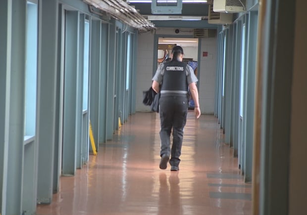 HMP corrections officer walking