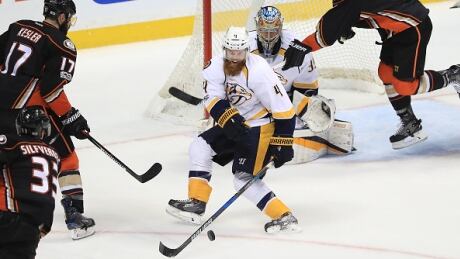 Defenceman Ryan Ellis, centre, was a first-round pick, but his re-emergence as a blue-line stud for the Predators has helped fuel their dominant playoff performance. ellis-ryan-051517