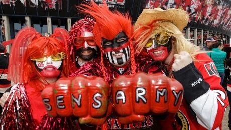 OTTAWA, ON - APRIL 15: Sens fans ham it up prior to the start of the game between the Boston Bruins and the Ottawa Senators in Game Two of the Eastern Conference First Round during the 2017 NHL Stanley Cup Playoffs at Canadian Tire Centre on April 15, 2017 in Ottawa, Ontario, Canada. (Photo by Jana Chytilova/Freestyle Photography/Getty Images) senators-fans-army-1180