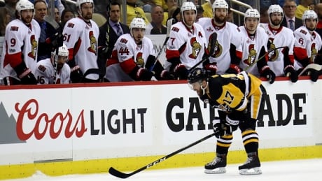 The Penguins' Bryan Rust was forced to leave Monday's game against the Senators after getting hit by Senators defenceman Dion Phaneuf. Head coach Mike Sullivan says the forward will sit out Wednesday's Game 3 of the NHL Eastern Conference final in Ottawa. rust-bryan-051717