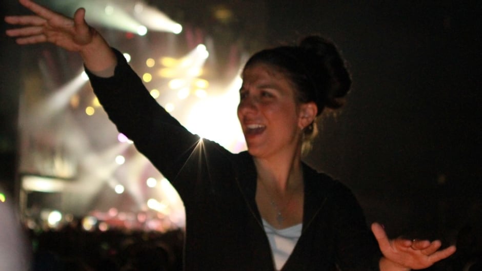 Holly Maniatty is an American Sign Language interpreter at concerts and music festivals.