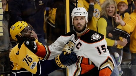 Anaheim's Ryan Getzlaf, right, and Nashville's P.K. Subban scuffle at the end of Tuesday's 2-1 win by the Predators. APTOPIX Ducks Predators Hockey