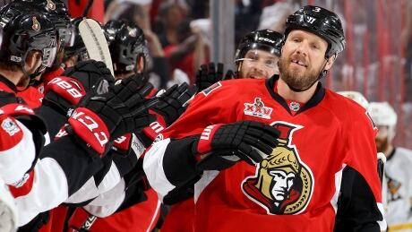 OTTAWA, ON - MAY 17: Marc Methot #3 of the Ottawa Senators celebrates with his teammates after scoring a goal against Marc-Andre Fleury #29 of the Pittsburgh Penguins during the first period in Game Three of the Eastern Conference Final during the 2017 NHL Stanley Cup Playoffs at Canadian Tire Centre on May 17, 2017 in Ottawa, Canada. (Photo by Jana Chytilova/Freestyle Photo/Getty Images) methot-marc-170517-1180