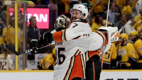 Anaheim Ducks centre Andrew Cogliano celebrates with goalie John Gibson after defeating the Nashville Predators in overtime of Game 4 of the Western Conference final in Nashville, Tenn on Thursday. The Ducks won 3-2. ducks-predators-051817-620