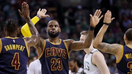 Cleveland Cavaliers forward LeBron James, centre, celebrates with teammates during his team's 130-86 rout of the Boston Celtics in Game 2 on Friday. James-LeBron-05192017