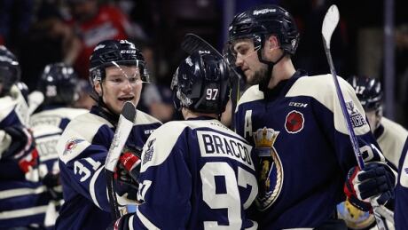 The Windsor Spitfires' Mikhail Sergachev, left, Jeremy Bracco, centre, and Logan Brown, left, are all promising prospects for Canadian NHL teams. sergachev-mikhail-052317