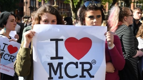 'We are the many, they are the few': Thousands gather at vigil for Manchester attack victims
