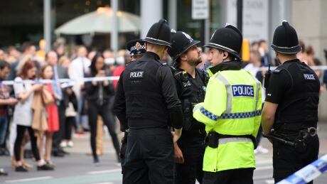 British police name suicide bomber, PM says threat level raised to 'critical'