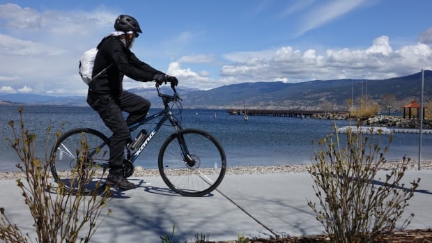 Penticton B.C. cyclist at lake