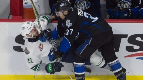 Saint John's Cole Reginato, right, collides with Seattle's Matthew Wedman during the Sea Dogs' 7-0 win Tuesday at the Memorial Cup in Windsor, Ont. HKO Memorial Cup 20170523