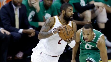 Cleveland's Kyrie Irving (2) drives against Boston Celtics' Avery Bradley during the Cavaliers win in Game 4 Tuesday. celtics-cavaliers
