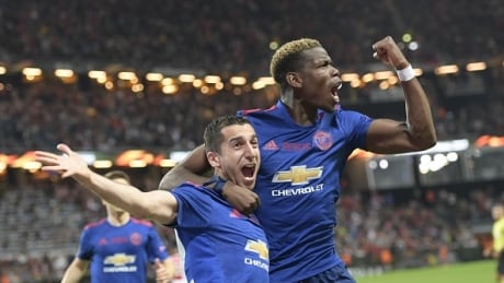 Manchester United's Henrikh Mkhitaryan and Paul Pogba celebrate after the former's goal gave the team a 2-0 lead it would not relinquish to clinch the Europa League championship on Wednesday. pogba-paul-mkhitaryan-henrikh-052417
