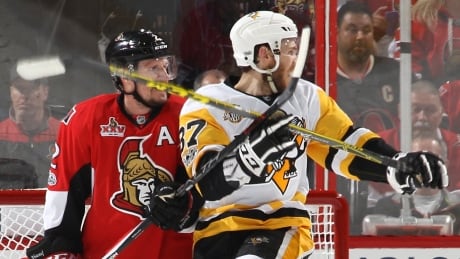 Ottawa's Dion Phaneuf, left, is confident his Senators can prevail over Sidney Crosby's Pittsburgh Penguins in Thursday's Game 7. 700047972JH00076_Pittsburgh