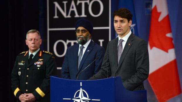 Trudeau suggests defence review will invest more in troops than weaponry Trudeau-europe-20170525