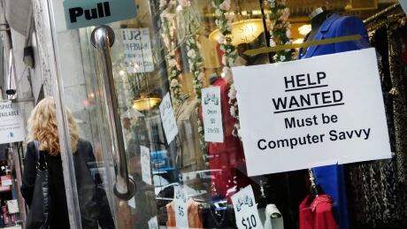 A "Help Wanted" sign hangs in a store window in New York. The Conference Board found consumer confidence in the U.S. is waning in part because of fears about the job market, but Commerce Department data shows third quarter growth was 2.1 per cent. Consumer Confidence
