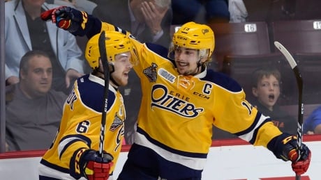 Erie Otters' Dylan Strome, right, celebrates his goal in the third period with teammate Jordan Sambrook. The Otters reached the Memorial Cup final with a 6-3 victory over the Saint John Sea Dogs on Friday in Windsor, Ont. Strome-Dylan-05262017