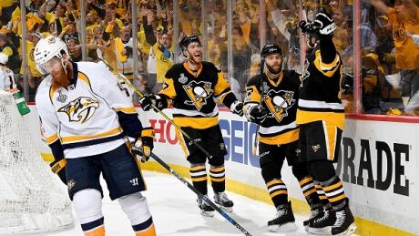 Pittsburgh's Nick Bonino celebrates his first-period goal against the Nashville Predators in Game 1 on Monday night. predators-penguins
