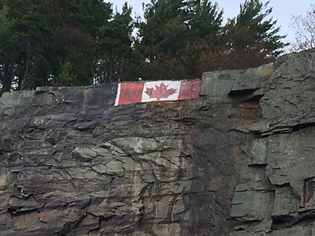 Pictograph site Canadian flag painted