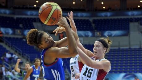 Michelle Plouffe, right, pictured at the 2014 FIBA world championships, co-led Canada with 14 points along with Jamie Scott in a defeat to third ranked France Thursday. plouffe-michelle-060117