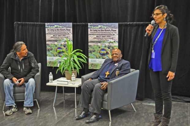 Eriel Deranger, environmental activist with Archbishop Desmond Tutu and Chief Allan Adam