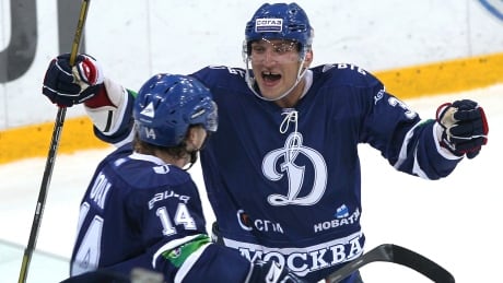 Washington Capitals star Alexander Ovechkin, right, is shown in this 2012 file photo during a KHL match between Dynamo Moscow and Dynamo Minsk, in Moscow. Storied Russian hockey club Dynamo Moscow says it has been raided by police, the latest twist in a bitter dispute over its finances. Russia Dynamo Moscow Corruption
