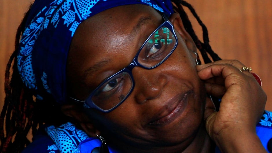 Stella Nyanzi stands in the dock at court in Kampala, Uganda, after she posted profanity-filled denunciations of president Yoweri Museveni on Facebook.