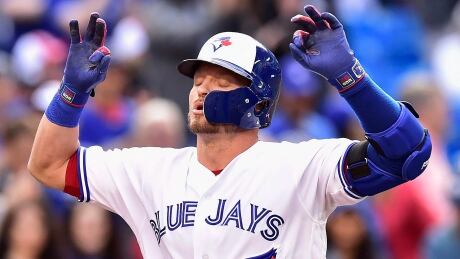 Josh Donaldson celebrates his first of two home runs against the New York Yankees as the Toronto Blue Jays hung on for a 7-5 victory on Friday evening. josh-donaldson