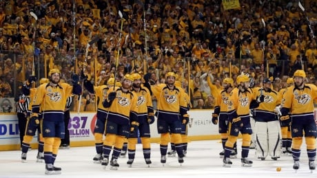 Predators players salute the fans after Game 3 of the Stanley Cup final, a game nearly 20 years in the making. Stanley Cup Penguins Predators Hockey
