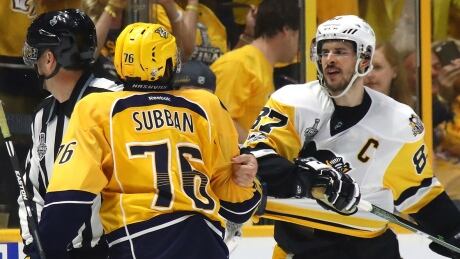 P.K. Subban, left, and Sidney Crosby, right, exchange words during Game 3 of the Stanley Cup final on Saturday night in Nashville. subban-crosby-1180