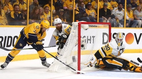 Nashville's Frederick Gaudreau scores a wraparound goal on Pittsburgh's Matt Murray early in the second period of Game 4 of the Stanley Cup final on Monday. 700056236JH00077_2017_NHL_S