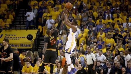LeBron James, left, insists he isn't exhausted from having to guard Kevin Durant, right, during the Finals. james-lebron-durant-kevin-060717