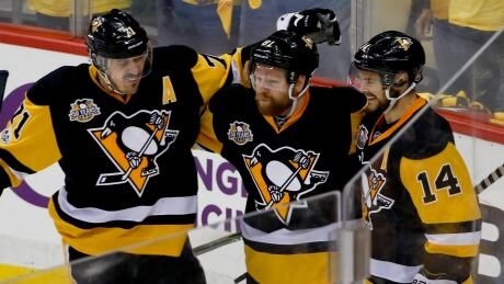 The Penguins need Evgeni Malkin, right, and Phil Kessel, centre, to start providing their usual offence if they want to take back control of the Stanley Cup final. kessel-phil-malkin-evgeni-060717