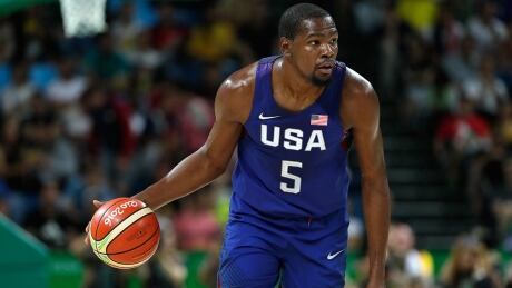 RIO DE JANEIRO, BRAZIL - AUGUST 21: Kevin Durant #5 of United States drives the ball against Serbia during the Men's Gold medal game on Day 16 of the Rio 2016 Olympic Games at Carioca Arena 1 on August 21, 2016 in Rio de Janeiro, Brazil. (Photo by Jamie Squire/Getty Images) durant-kevin-160821-1180