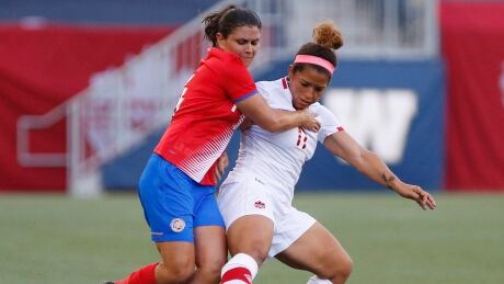 Desiree Scott, right, and the Canadian squad won 3-1 over Costa Rica in front of her hometown of Winnipeg on Thursday evening. desiree-scott
