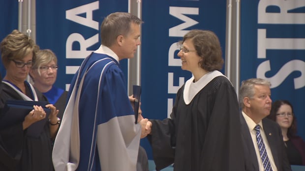 Meunier accepts her degree from the Nova Scotia community College.