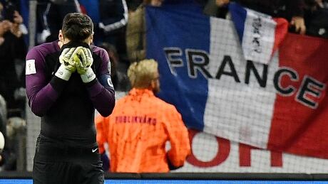 France's goalkeeper Hugo Lloris shows his disappointment after his gaffe led to a 2-1 loss to Sweden Friday in World Cup qualifying. AFP_PF4EI