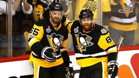 Ron Hainsey, left, and the Pittsburgh Penguins defenceman are moving the puck quickly very similar to injured star Kris Letang. ron-hainsey