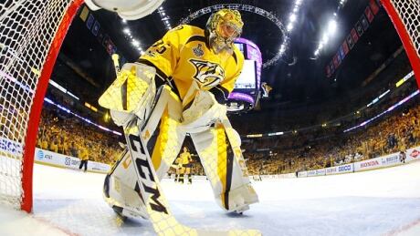 Nashville Predators goalie Pekka Rinne takes a break during a time-out against the Pittsburgh Penguins during the second period in Game 4 in Nashville. rinne-pekka