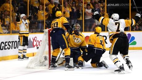Patric Hornqvist, left, celebrates after putting the Penguins ahead late in the third period of Game 6. 700056240MR00170_2017_NHL_S