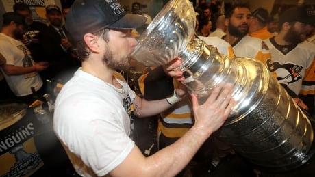 Sidney Crosby drinks from the Stanley Cup for the third time in his career. 700056240RH00001_2017_NHL_S