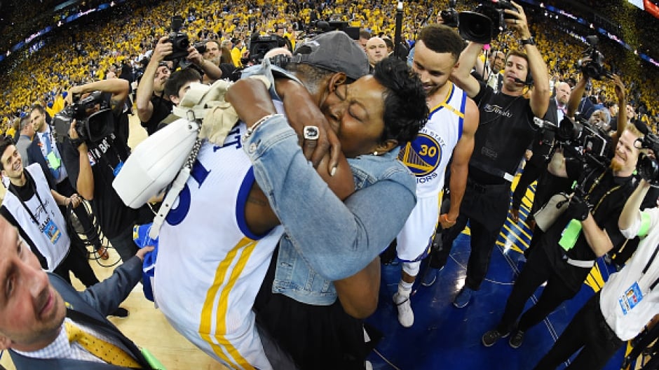 OAKLAND, CA - JUNE 12: Kevin Durant #35 of the Golden State Warriors and his mother Wanda Durant celebrate after winning the 2017 NBA Finals.