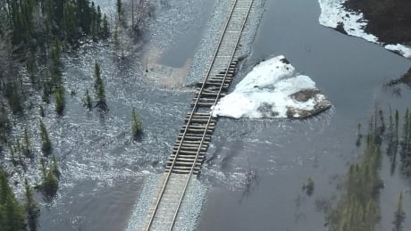 A section of tracks destroyed south of Churchill. Flooding