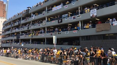 As many as 500,000 fans are expected to turn out for the Pittsburgh Penguins' Stanley Cup parade on Wednesday. penguins-fans-140617
